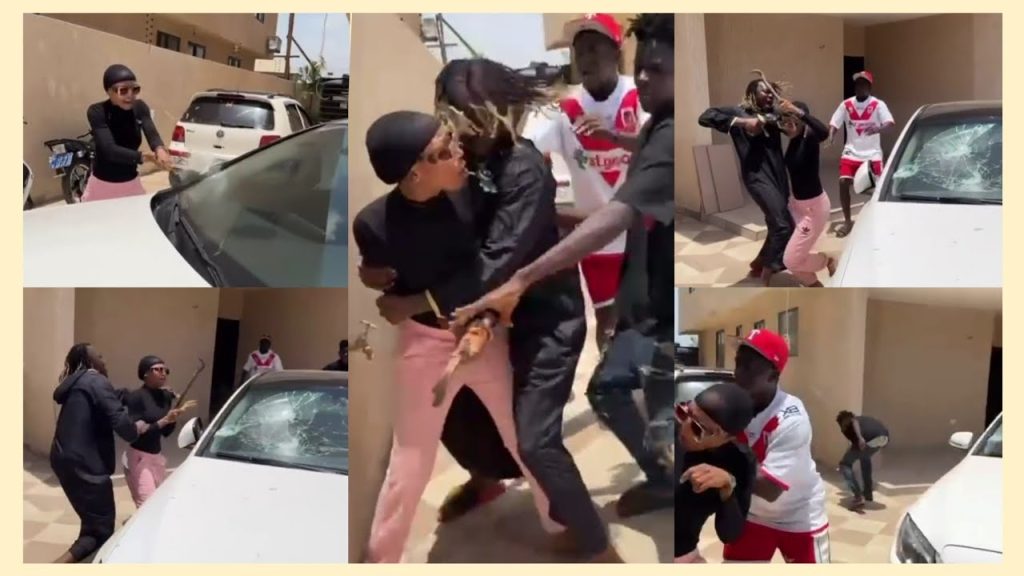 Akuapem Poloo, enraged, breaks the musician's Mercedes' windscreen during a confrontation.